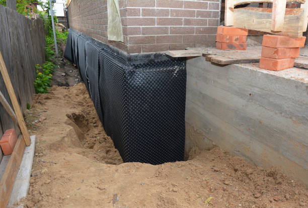 SJ Waterproofing Pros technician performing targeted Foundation Crack Repair assessment in Springfield, OR
